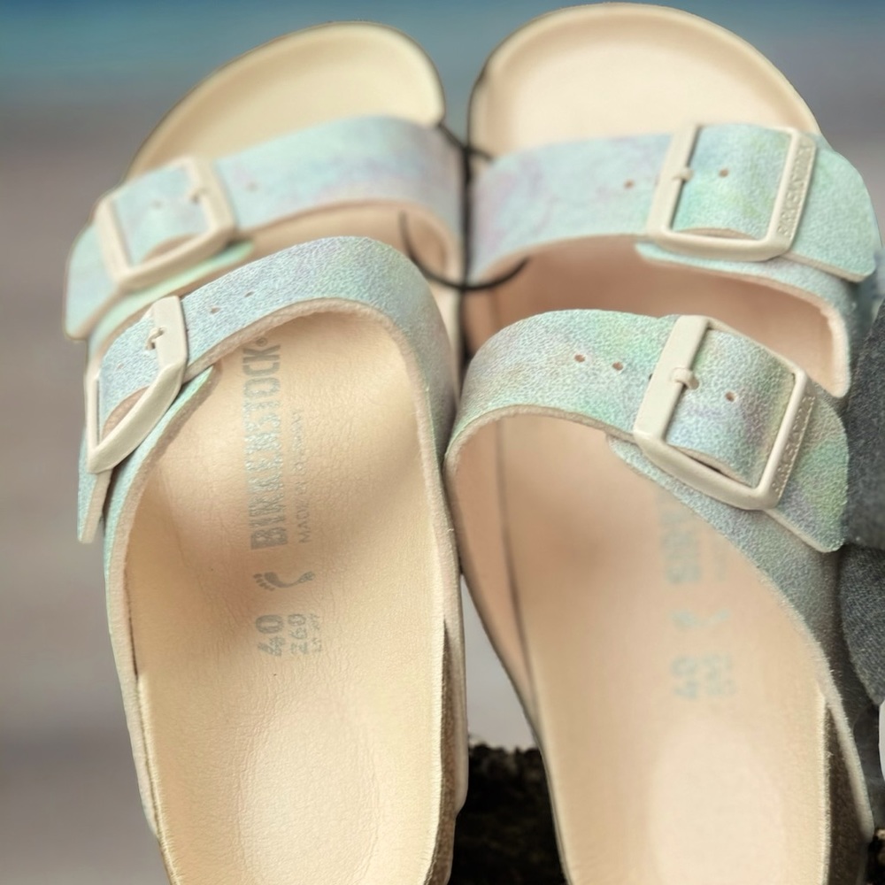 Cute Birkenstocks! They have opalescent/iridescent straps with peach buckles